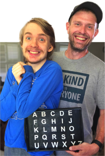 Austin holding a letter board with a happy client